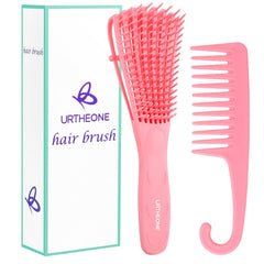URTHEONE detangling brush in pink with a comfortable grip for easy detangling.