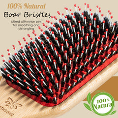 URTHEONE hair brush wooden paddle handle demonstrates ergonomic grip for detangling