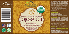 US Organic Jojoba Oil label close-up emphasizes 100% purity and organic certification