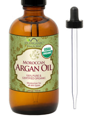 US Organic Moroccan Argan Oil bottle close-up emphasizing premium amber packaging for hair and skin care
