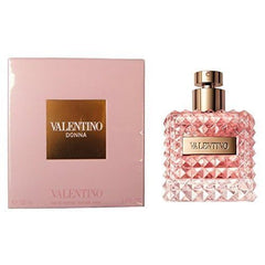 Valentino Donna EDP heart notes iris and Bulgarian rose, elegant floral core.