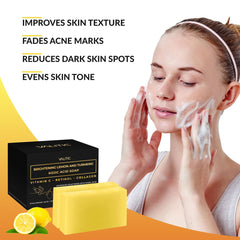 VALITIC lemon-turmeric soap bar closeup showing creamy lather texture.