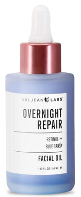 VALJEAN LABS Overnight Repair Oil bottle pour for a soothing nightly routine.