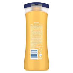 Vaseline Intensive Care Nourishing Argan Oil Lotion 400ml bottle close-up with creamy texture.