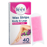 Veet Ready To Use Wax Strips packaging demonstrates convenient at-home waxing without heating