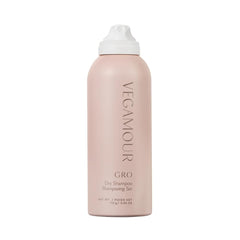 VEGAMOUR GRO Dry Shampoo bottle pouring for quick refresh and lift.
