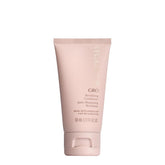 VEGAMOUR GRO Revitalizing Conditioner travel-size bottle for on-the-go hydration and shine.