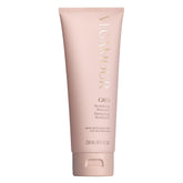 VEGAMOUR GRO Revitalizing Shampoo bottle with citrus scent supports daily cleansing and scalp nourishment.