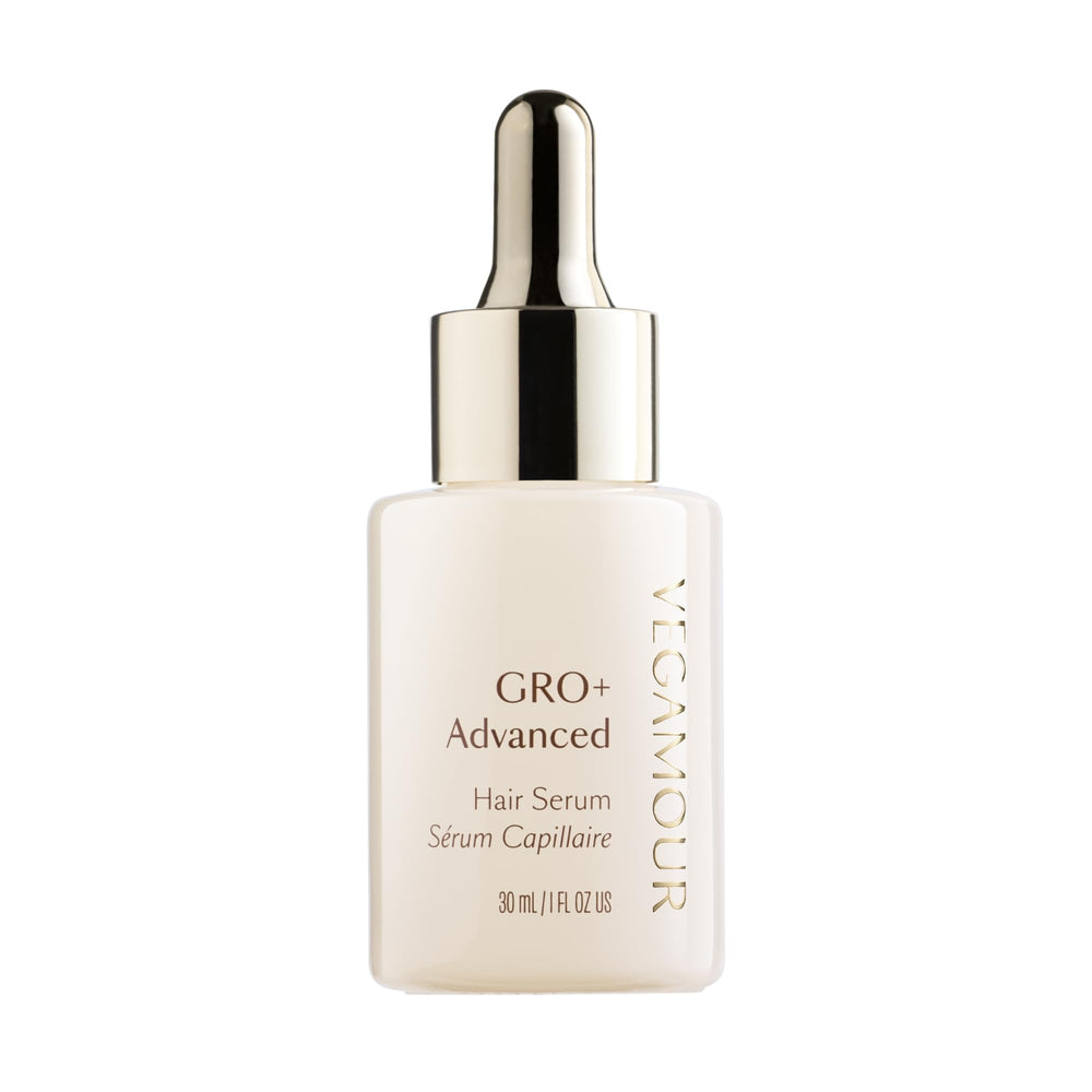 VEGAMOUR GRO+ serum bottle highlights lightweight hydration for a non-greasy scalp care routine.