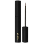Velour Strong Eyelash Glue with brush-on applicator for precise, mess-free lash application.