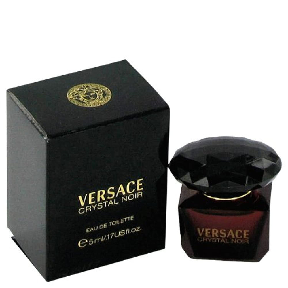 Versace Crystal Noir mini bottle closeup, portable luxury for on-the-go fragrance moments.