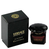 Versace Crystal Noir mini bottle closeup, portable luxury for on-the-go fragrance moments.