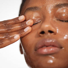Versed Day Dissolve Balm on dry face, ready to remove makeup.