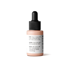 Versed Stroke of Brilliance Serum amber bottle on shelf suggests premium, brightening skincare.