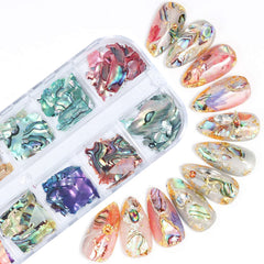 Vezocim irregular shell patterns offer bold DIY nail accents.