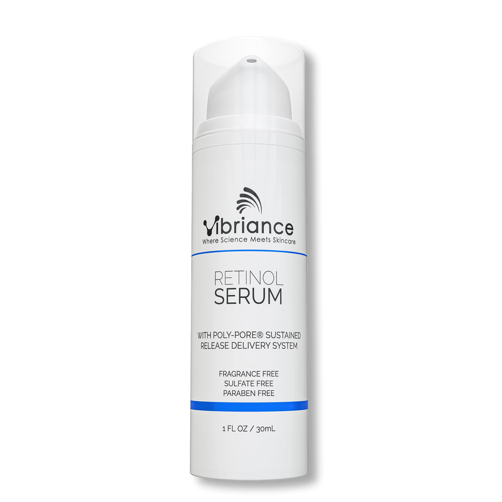 Vibriance Retinol Serum bottle pour showing night-time application.