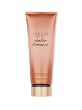 Victoria's Secret Amber Romance bottle close-up highlighting warm amber notes for evening fragrance