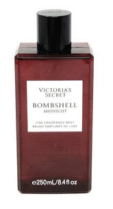 Victoria's Secret Bombshell Midnight bottle-pour highlights fragrance release for celebrations.