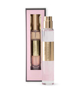 Victoria's Secret Bombshell travel spray bottle closeup shows portable freshness for on-the-go touchups.