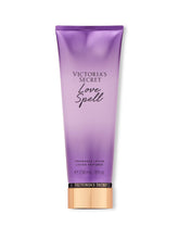 Victoria's Secret Love Spell lotion bottle closeup showing nourishing hydration for smooth skin.