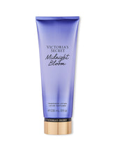Victoria's Secret Midnight Bloom lotion bottle supports daily moisturization with a light fragrance boost.