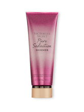 Victoria's Secret Pure Seduction Shimmer bottle showing fruity plum and freesia notes for lasting fragrance
