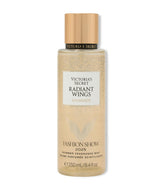 Victoria's Secret Radiant Wings bottle on vanity, sparkling fragrance for everyday glamour and confidence.