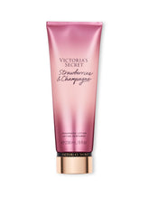 Victoria's Secret Strawberries & Champagne lotion bottle hydrates and layers with fragrance