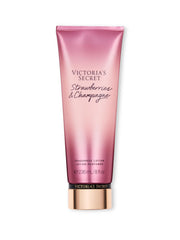 Victoria's Secret Strawberries & Champagne lotion bottle hydrates and layers with fragrance