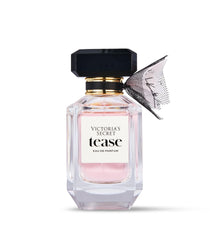 Victoria's Secret Tease packaging box shot emphasizes irresistible scent promise for her.