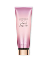 Victoria's Secret Velvet Petals lotion bottle ready for daily skin hydration.