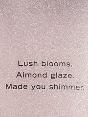 Victoria's Secret Velvet Petals Shimmer Body Lotion providing 24-hour moisture on skin.