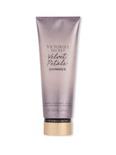 Victoria's Secret Velvet Petals Shimmer Lotion bottle for everyday scented hydration.