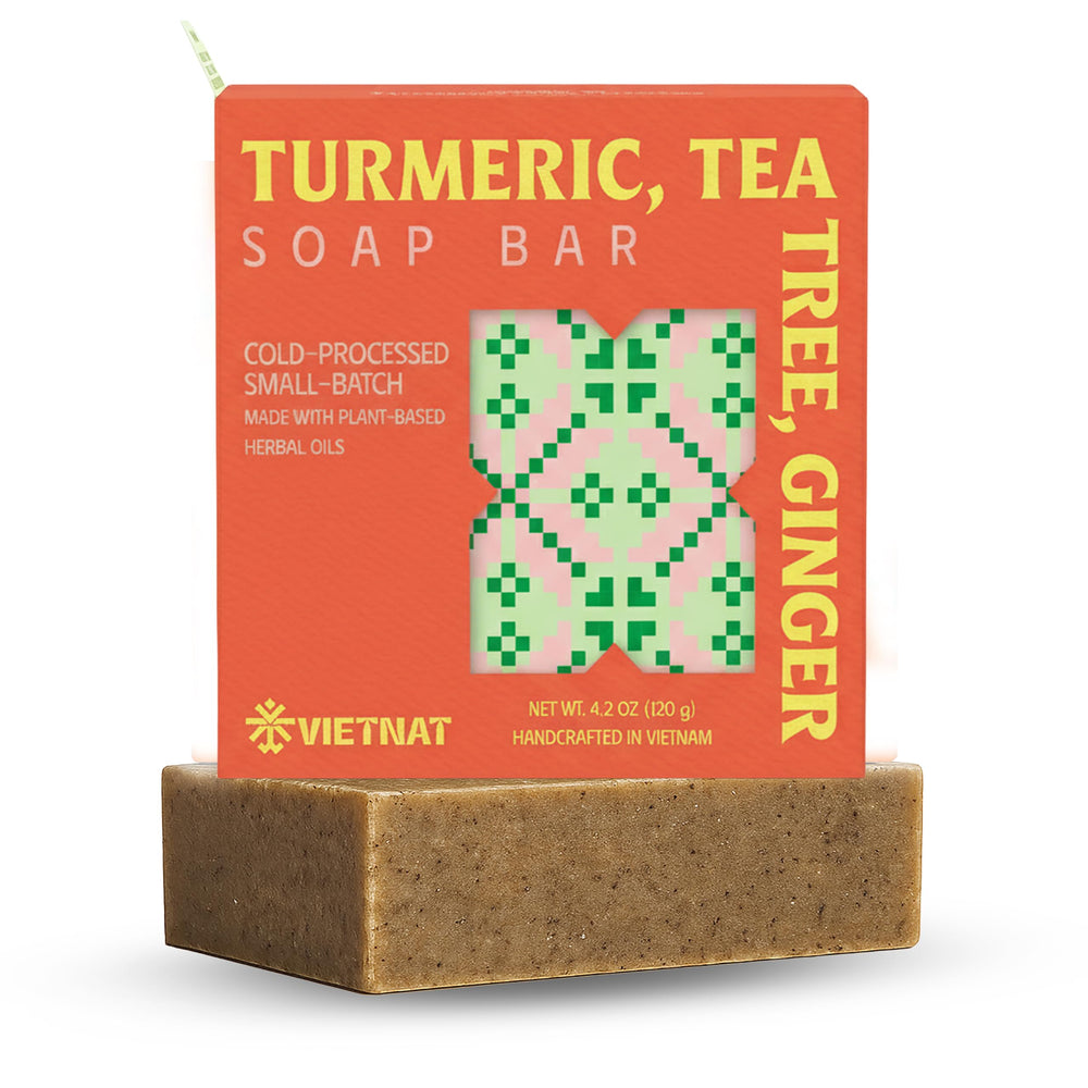 VIETNAT turmeric-tea-tree-ginger soap bar raw block showcases natural ingredients for everyday cleanse.