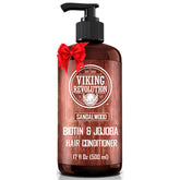 Viking Revolution sandalwood conditioner bottle label highlights biotin and jojoba benefits.