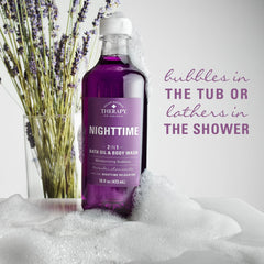 Village Naturals Therapy Nighttime Relief bath oil on a shower pouf for easy cleansing.