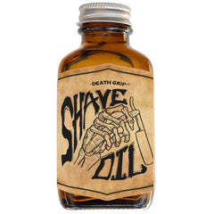 The Vintage Grooming Co Shave Oil Tea Tree bottle offers natural glide for a smoother shave.