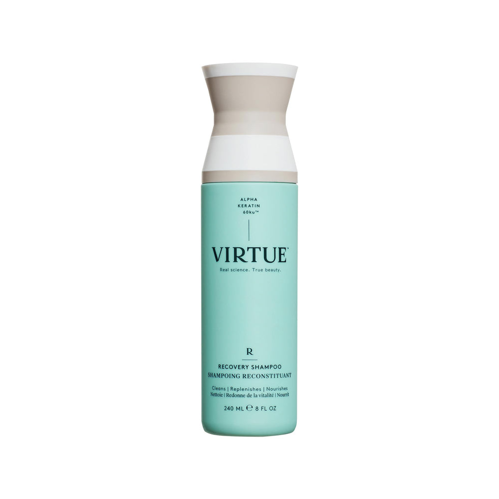 Virtue Recovery Shampoo bottle on shelf showing keratin-rich formula for damaged hair