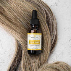Vitality Hair Envy drops close-up emphasizing pure essential oils