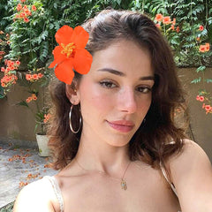 VOBOBE Hawaiian flower clip pink brightens casual hairstyles and beach-ready looks.