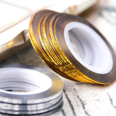 Vonrui nail tape silver and gold on nails demonstrates stylish metallic accents.