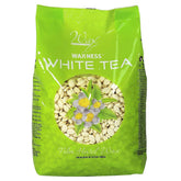 Wax Necessities packaging highlights film hard wax beads with White Tea Cream for sensitive skin.