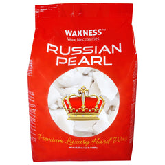 Wax Necessities polymer blend wax closeup shows smooth creamy texture for comfortable bikini waxing.