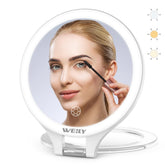 WEILY travel mirror shows 10x/1x magnification for precise makeup checks.