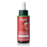 Weleda Face Care Plumping Serum bottle close-up highlighting hydrating formula.