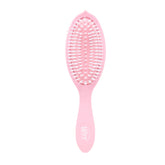 Wet Brush Go Green Watermelon Oil bottle close-up showing nourishing treatment