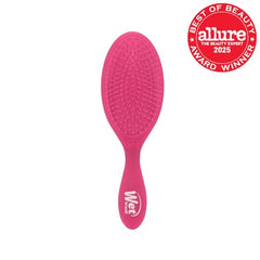Wet Brush Original Detangler Pink Frost in-use hair detangling for smooth combing.