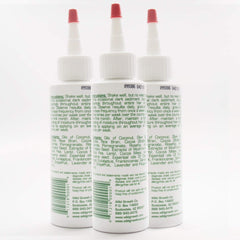 Wild Growth Hair Oil pour illustrating easy application for smoother styling