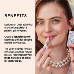 Winky Lux Balm pink-tint swirl on lips for sheer color.