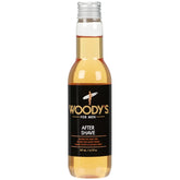 Woody's Aftershave Tonic bottle close-up for soothing post-shave relief.